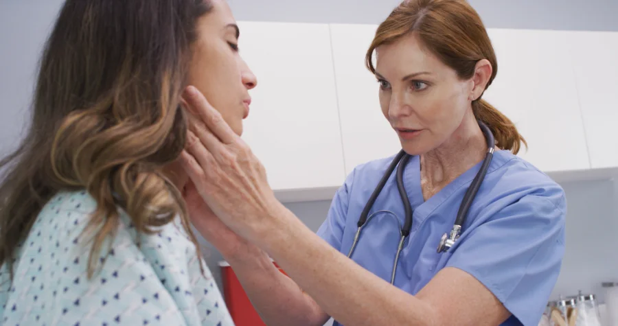 A woman seeing a doctor because of her mucus in throat after acdf surgery