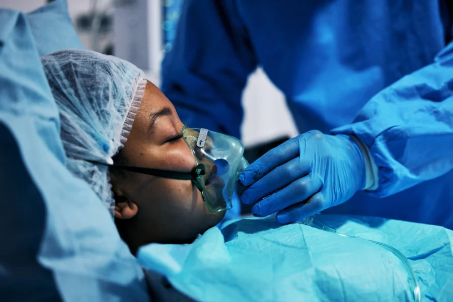 A woman about to go into surgery before experiencing mucus in throat after acdf surgery