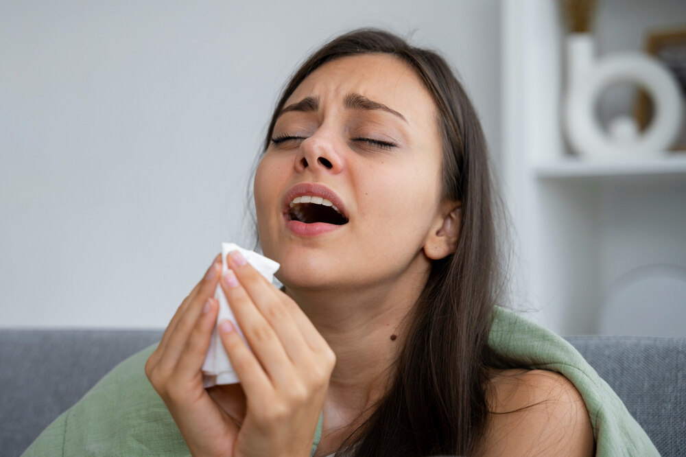 A lady with a cold experiencing weird metallic taste disruptions to her taste buds. 