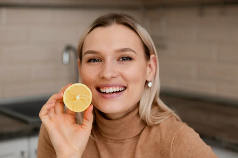 A woman who wondered “Why Does Dysgeusia Happen?” adding lemon juice to things to try minimizing the discomfort she experiences from metallic taste.